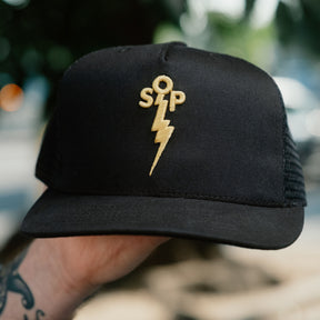 Snake Oil Provisions Lightning Bolt Trucker Hat Black/ Gold