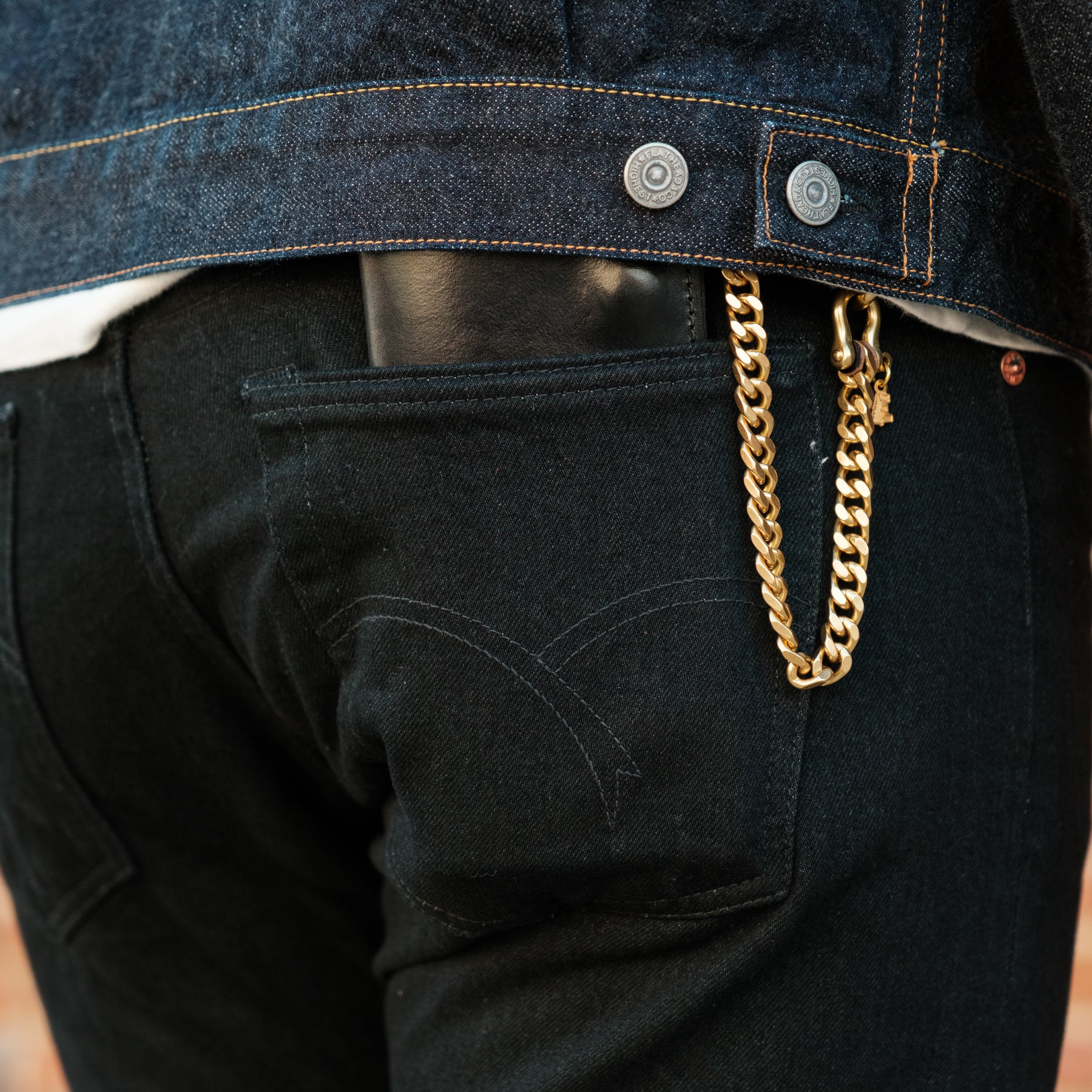 The Flat Tapered Straight Black Head Jeans